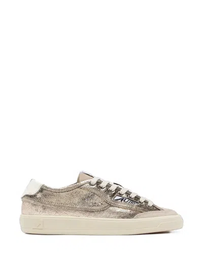 Autry Windscape Cracked-leather Suede Sneakers In Gold