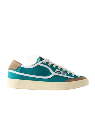 Autry Windscape Low Suede-trimmed Canvas Sneakers In Blue