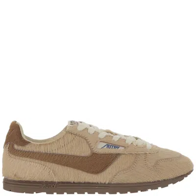 Autry Windspin Leather Sneakers In Pink