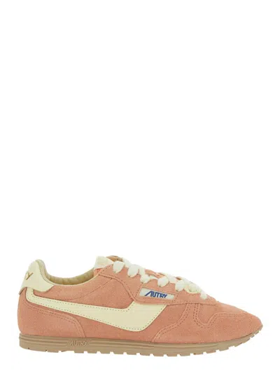 AUTRY 'WINDSPIN LOW' PINK SNEAKER WITH LOGO ON THE SIDE AND ON THE HEEL IN SUEDE WOMAN
