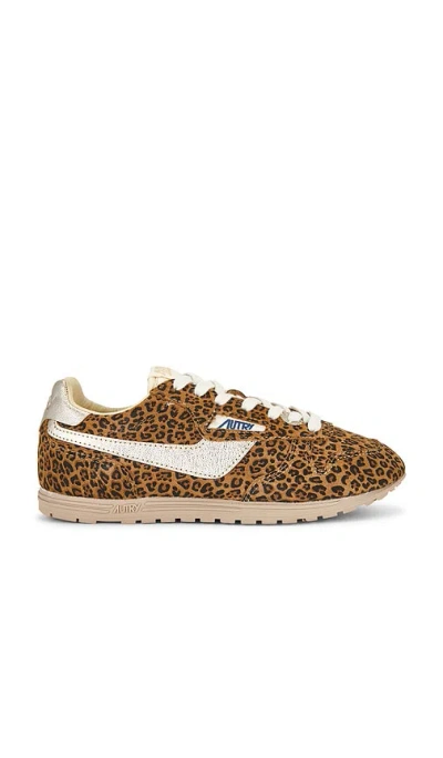 Autry Brushed Suede And Leather Sneakers With Jacquard Logo In Multi