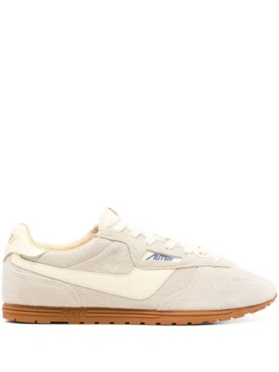 Autry Low Suede Leather Sneakers With Perforated Toe In Neutral