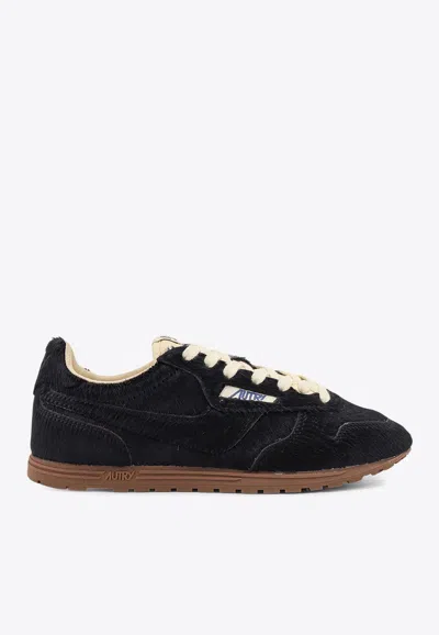 Autry Windspin Metallic Leather Sneakers In Black