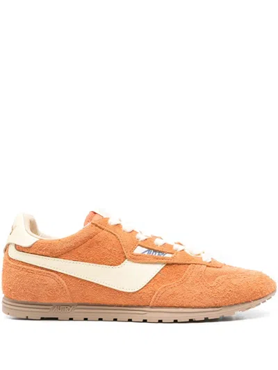 Autry Low Top Suede Sneakers With Contrast Sole In Arancio