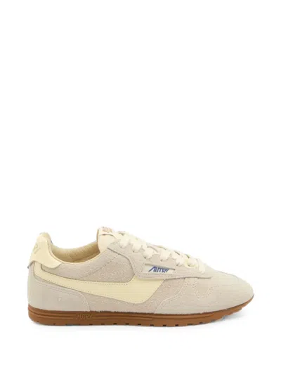 Autry Low Suede Leather Sneakers With Perforated Toe In Neutral