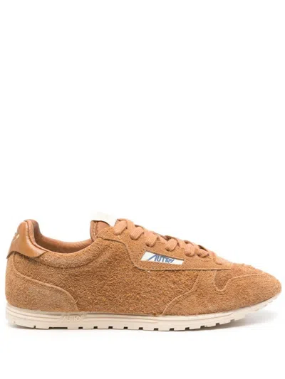 AUTRY 'WINDSPIN' SUEDE SNEAKERS IN CAMEL BROWN
