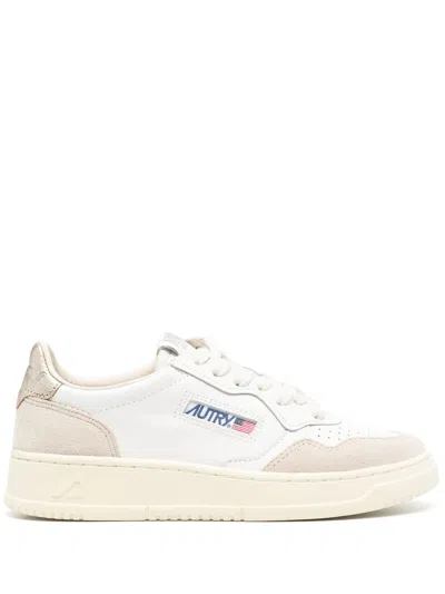 Autry Women's Mini Perforated Leather Sneakers With Embossed Detail In White
