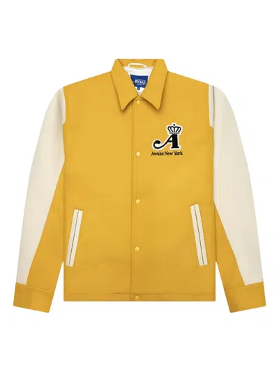 Awake Ny Crown Varsity Jacket In Yellow