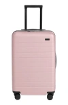 Away The Bigger Carry-on Flex Suitcase In Pink