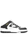 Axel Arigato 'area Lo' Black And White Low Top Sneakers With Laminated Leather