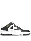 Axel Arigato 'area Lo' Black And White Low Top Sneakers With Laminated Leather In Leather Blend Woman In Black