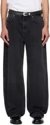 Axel Arigato Embroidered Relaxed Jeans In Black