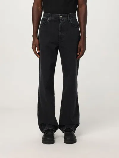 Axel Arigato Jeans  Men Color Black