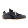 Axel Arigato Slow Runner Black Sneaker With Insert Design And Grooved Sole In Leather And Suede Man In Black