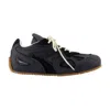 Axel Arigato Slow Runner Black Sneaker With Insert Design And Grooved Sole In Leather And Suede Man In Black