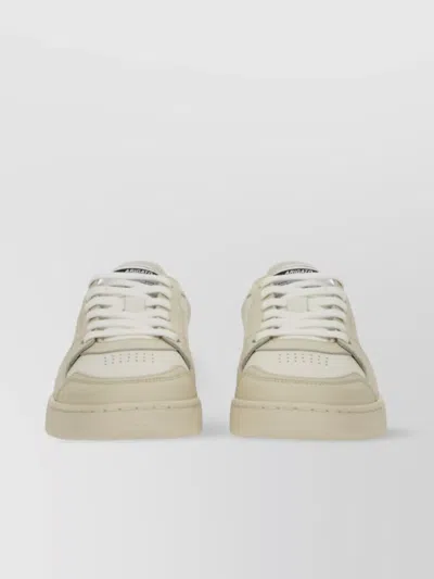 Axel Arigato Sneaker "says It" With Contrast Heel Panel