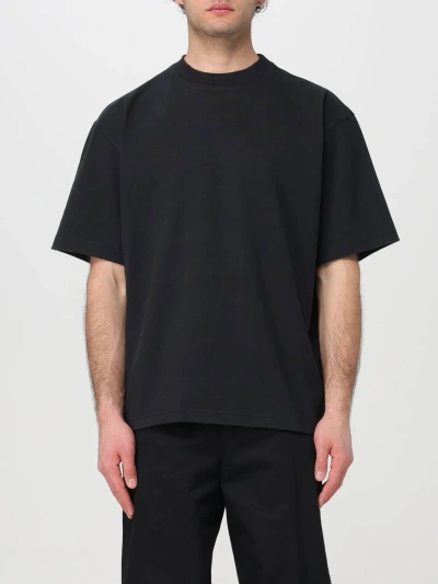 Axel Arigato T-shirt  Men Colour Black