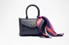 B. Hartzell Mini Crossbody In Navy In Blue