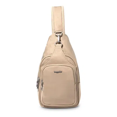 Baggallini Central Park Sling Bag In Champagne Puff