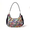 Baggallini Coastal Flip Lock Half Moon Bag In Multi