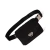 Baggallini Coastal Flip Lock Sling Bag