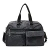 Baggallini Modern Everywhere Travel Duffel In Midnight Blossom Print