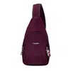 Baggallini The Travel Smart Edit Securtex Anti Theft Daytripper Sling Bag In Purple