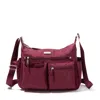 Baggallini Women's Anywhere Large Hobo Handbag With Rfid Wristlet In Red