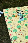 Baggu Puffy Picnic Blanket In Kite Eating Tree At Urban Outfitters In Multi
