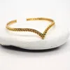 Baizaar Women's Spotted Chevron Bangle Bracelet In Brass In Multi