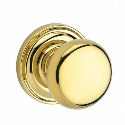 Baldwin Round Passage Door Knob With Traditional Round Rose In Polished Brass