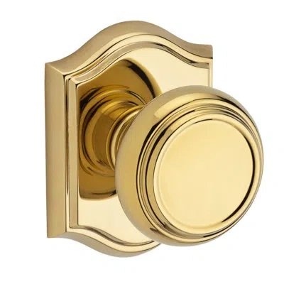 Baldwin Traditional Double Dummy Door Knob With Traditional Arch Rose In Polished Brass