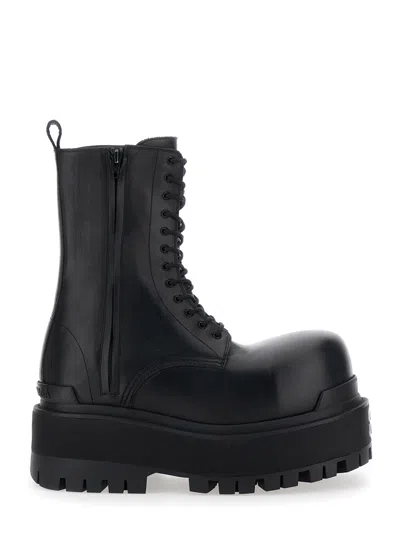 BALENCIAGA BALENCIAGA MEN BLACK ANKLE BOOTS WITH LOGO PLAQUE ON THE FRONT AND SIDE ZIPS IN LEATHER MAN