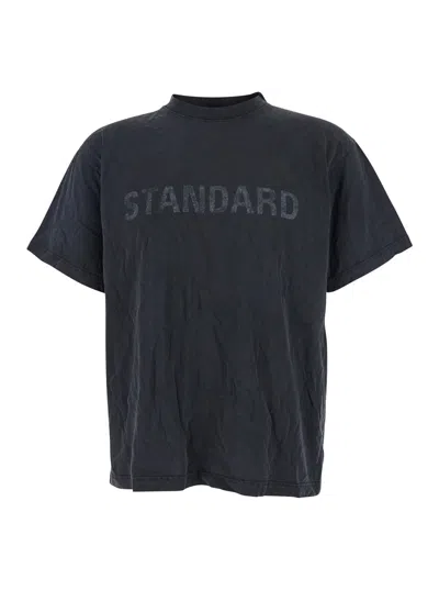 BALENCIAGA BLACK CREWNECK T-SHIRT WITH LOGO PRINT ON THE FRONT IN COTTON MAN