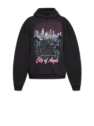BALENCIAGA BALENCIAGA BLACK HOODIE, WITH LARGE COLOR PRINT ON THE FRONT.