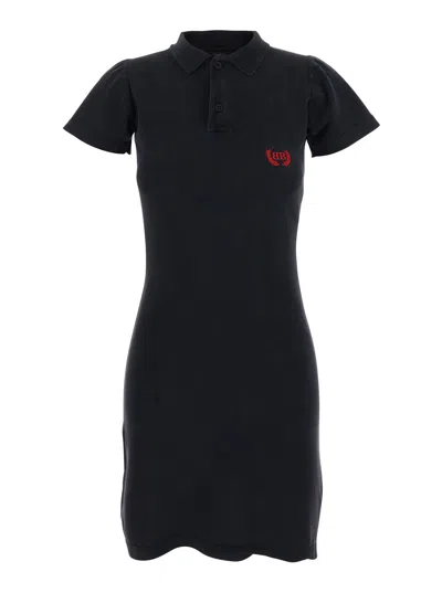 BALENCIAGA BLACK MINI DRESS WITH POLO SHIRT STYLE COLLAR AND LOGO DETAIL ON THE FRONT IN COTTON WOMAN