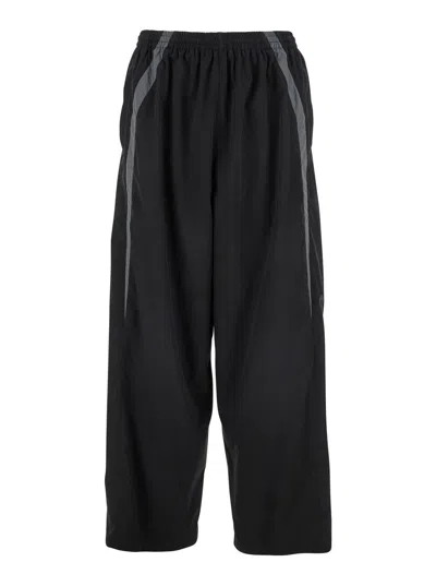 Balenciaga Black Oversized Tracksuit Pants With Contrasting Yokes In Tech Fabric Man