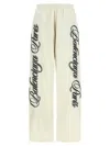 Balenciaga Cursive-embroidered Polyamide Joggers In Neutral