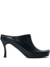 Balenciaga Debossed Logo Heeled Mules In Black