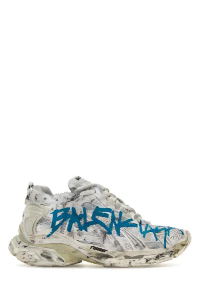Balenciaga Distressed White Sneakers With Bold Graphic Print