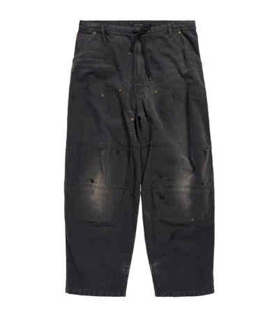 Balenciaga Distressed Denim Trousers In Black