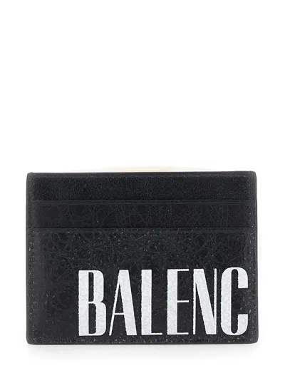 BALENCIAGA BALENCIAGA MEN 'EDITOR' BLACK CARD HOLDER WITH FOUR CARD SLOTS AND MAXI LOGO LETTERING PRINT IN LEAT