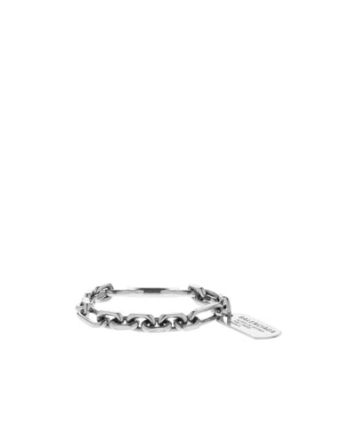 Balenciaga Engraved-logo Bracelet In Gray