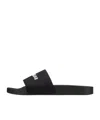 Balenciaga Logo-embossed Rubber Slides In Black