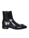 Balenciaga Glossy Ankle Boots With Pointed Toe And Logo Embellishment In Black