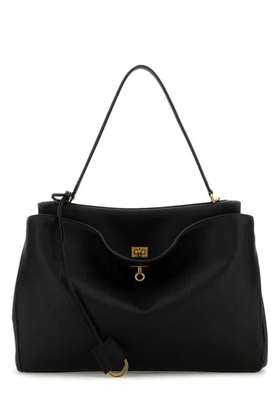 Balenciaga Handbags. In Black