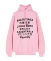 Balenciaga Languages Print Hoodie In Pink