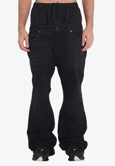 BALENCIAGA LAYERED FLARED JEANS