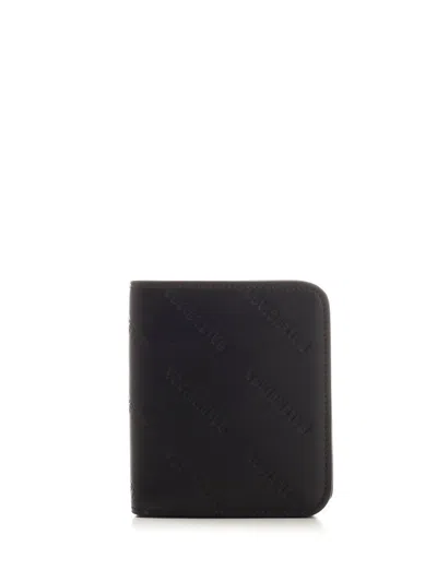 Balenciaga Logo Embossed Cash Flap Cardholder In Black