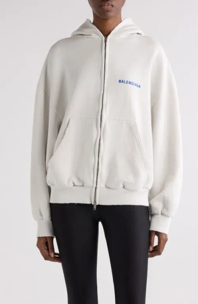 BALENCIAGA BALENCIAGA LOGO EMBROIDERED DISTRESSED DRY FLEECE ZIP HOODIE